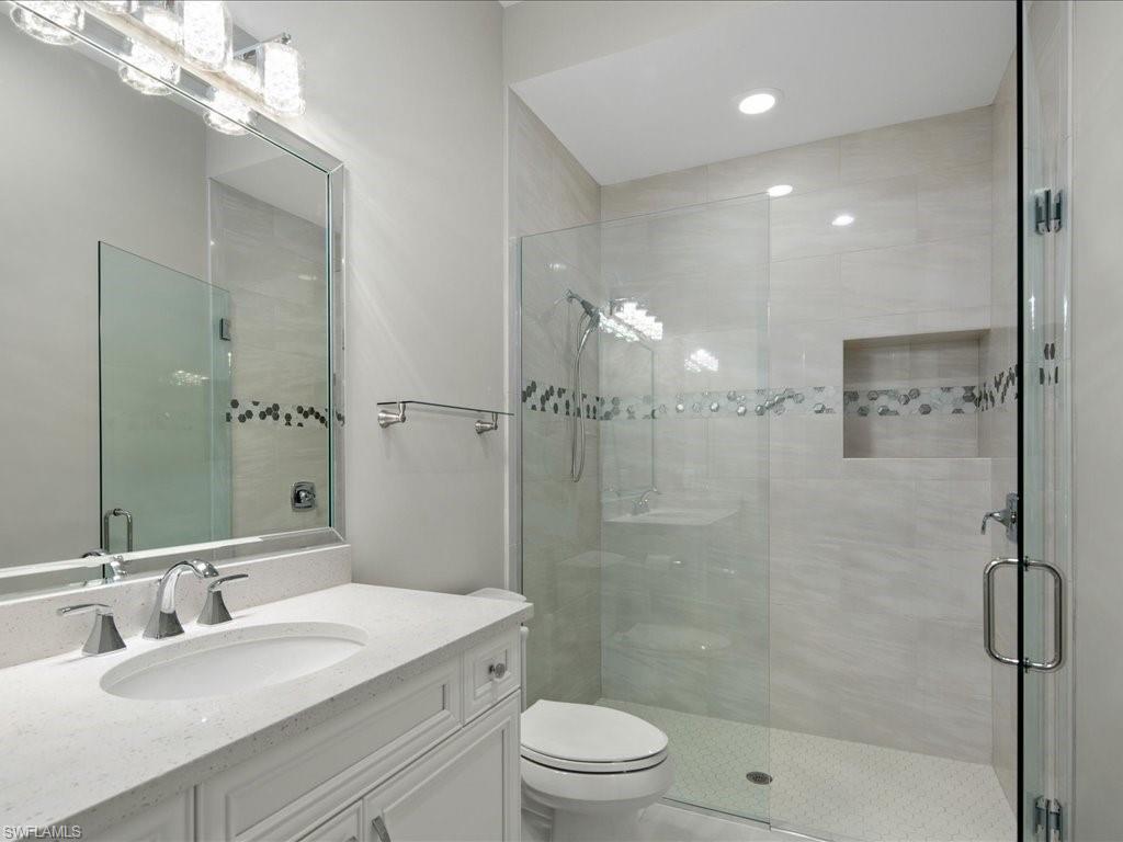 18460 Blue Eye Loop Fort Myers, FL 33913 - Photo 20 of 50 a bathroom with a sink a toilet and shower