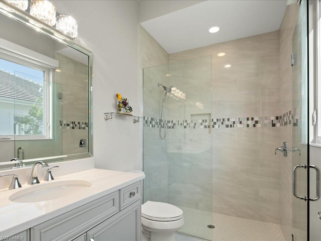 18460 Blue Eye Loop Fort Myers, FL 33913 - Photo 22 of 50 a bathroom with a sink a toilet and shower