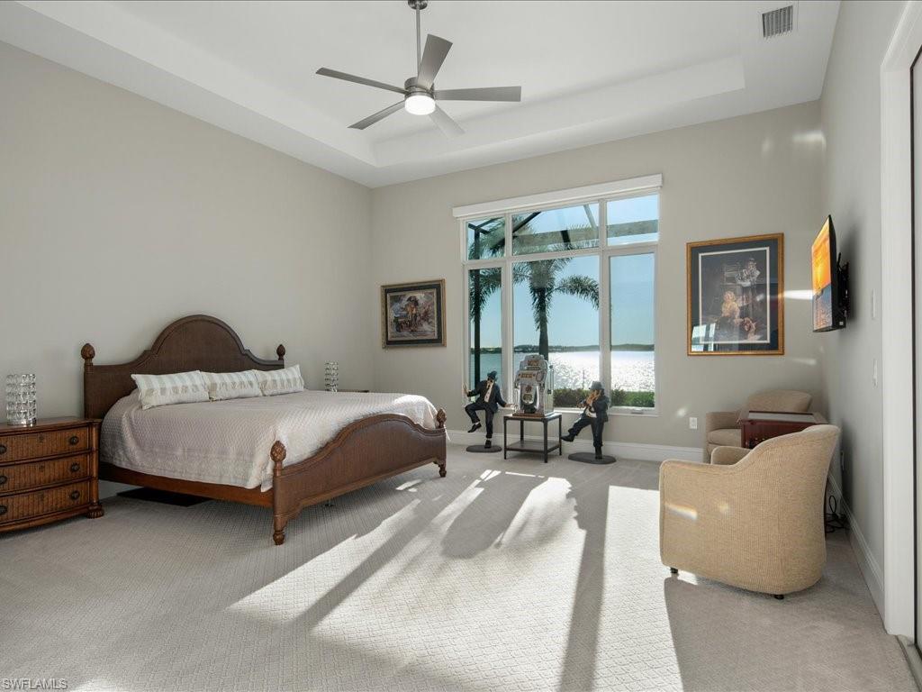 18460 Blue Eye Loop Fort Myers, FL 33913 - Photo 23 of 50 a bedroom with a bed couch and window