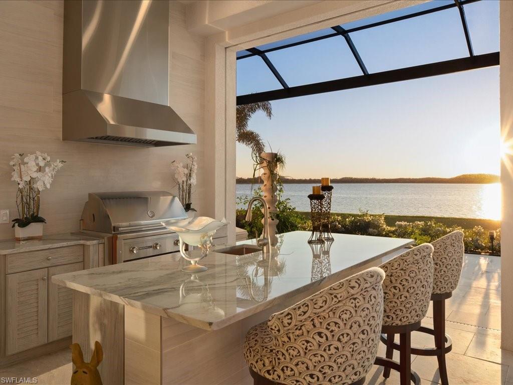 18460 Blue Eye Loop Fort Myers, FL 33913 - Photo 33 of 50 a kitchen with a sink and cabinets