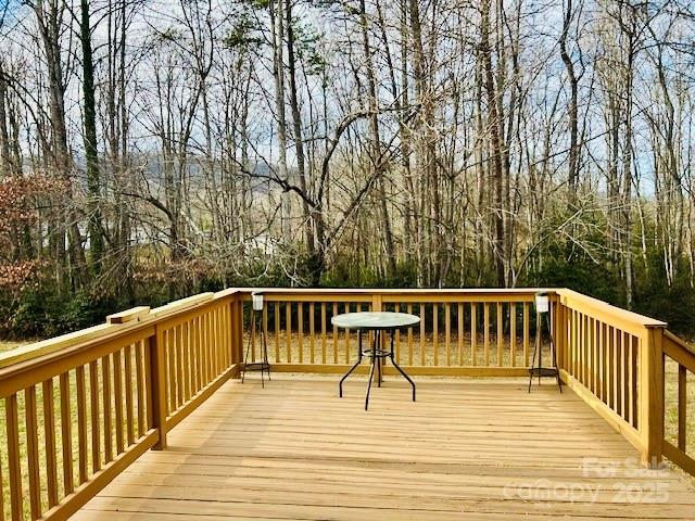 185 Creasman Hill Road Mills River, NC 28759 - Photo 4 of 5 a view of balcony with wooden floor and fence