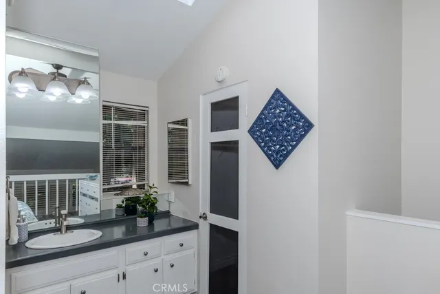 a bathroom with a shower and a toilet