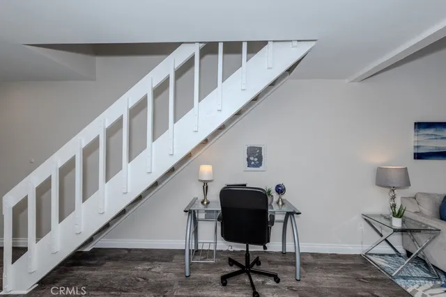 a view of a backyard with sitting area