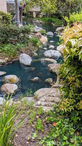 a view of outdoor sitting area with furniture