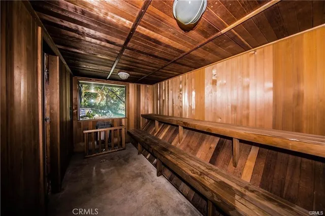 a view of a swimming pool with a house