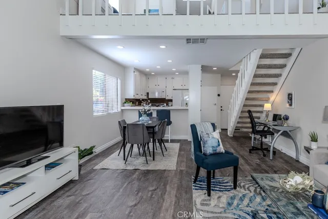 a kitchen with a table and chairs in it