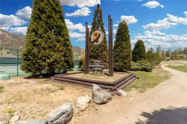 an aerial view of a houses with outdoor space