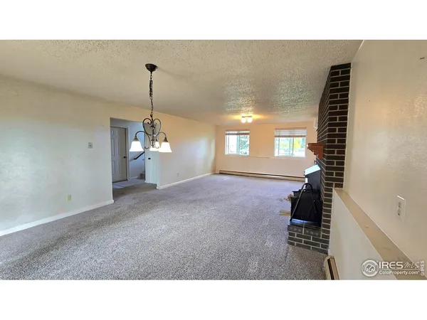 a open living room with a bathroom