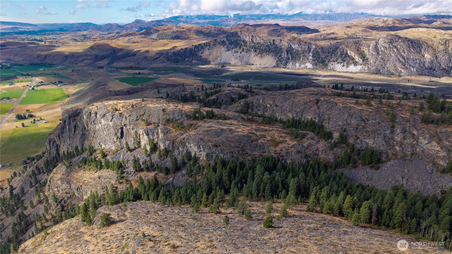 0 Tbd Pharr Out Way Riverside, WA 98849 - Photo 9 of 11 a view of a yard with wooden fence