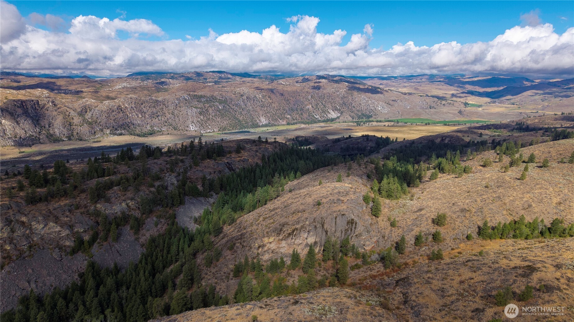 0 Tbd Pharr Out Way Riverside, WA 98849 - Photo 10 of 11 a view of a lake with green space