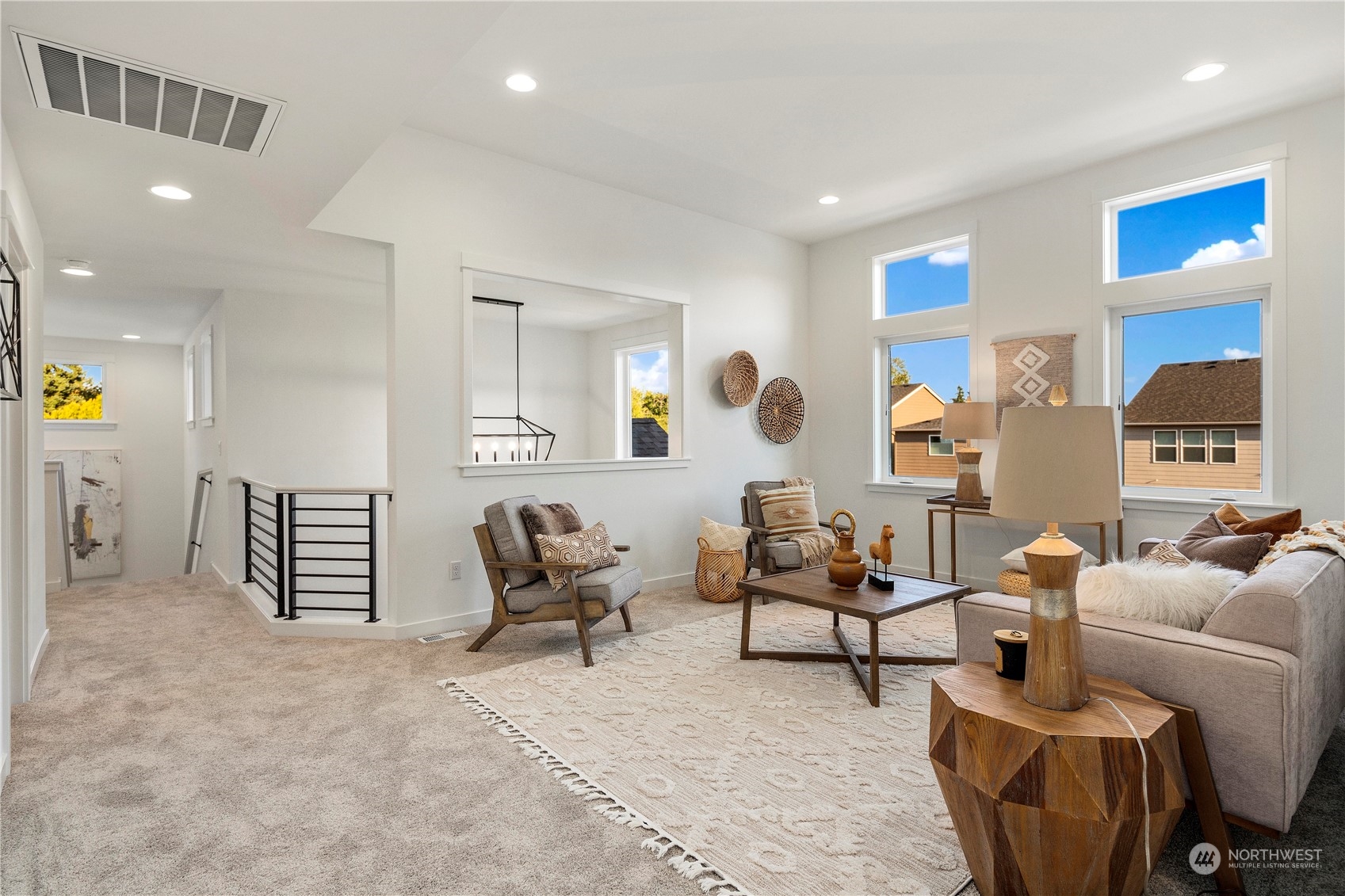 11 179th Place Southwest Bothell, WA 98012 - Photo 23 of 29 a living room with furniture and white walls