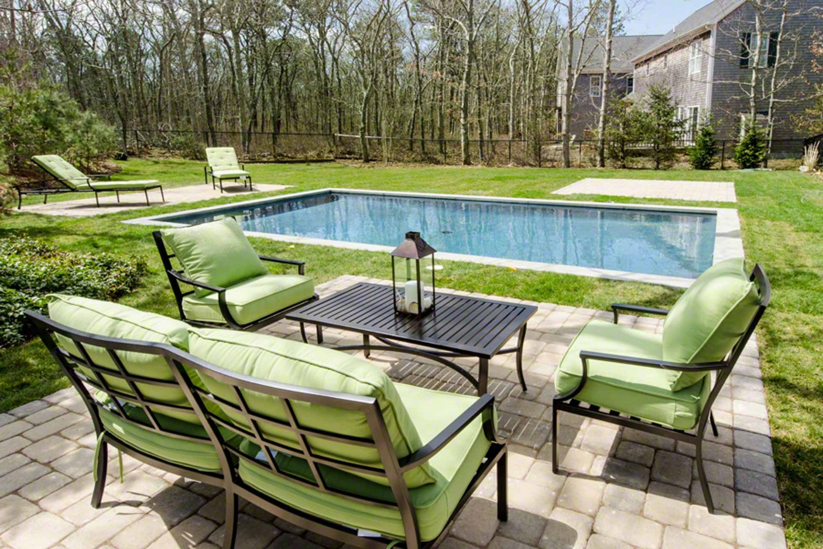 40 Dark Woods Road Edgartown, MA 02539 - Photo 2 of 20 a view of a chairs and table on the deck