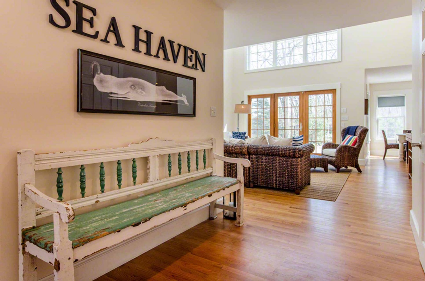 40 Dark Woods Road Edgartown, MA 02539 - Photo 5 of 20 a living room with furniture and a floor to ceiling window
