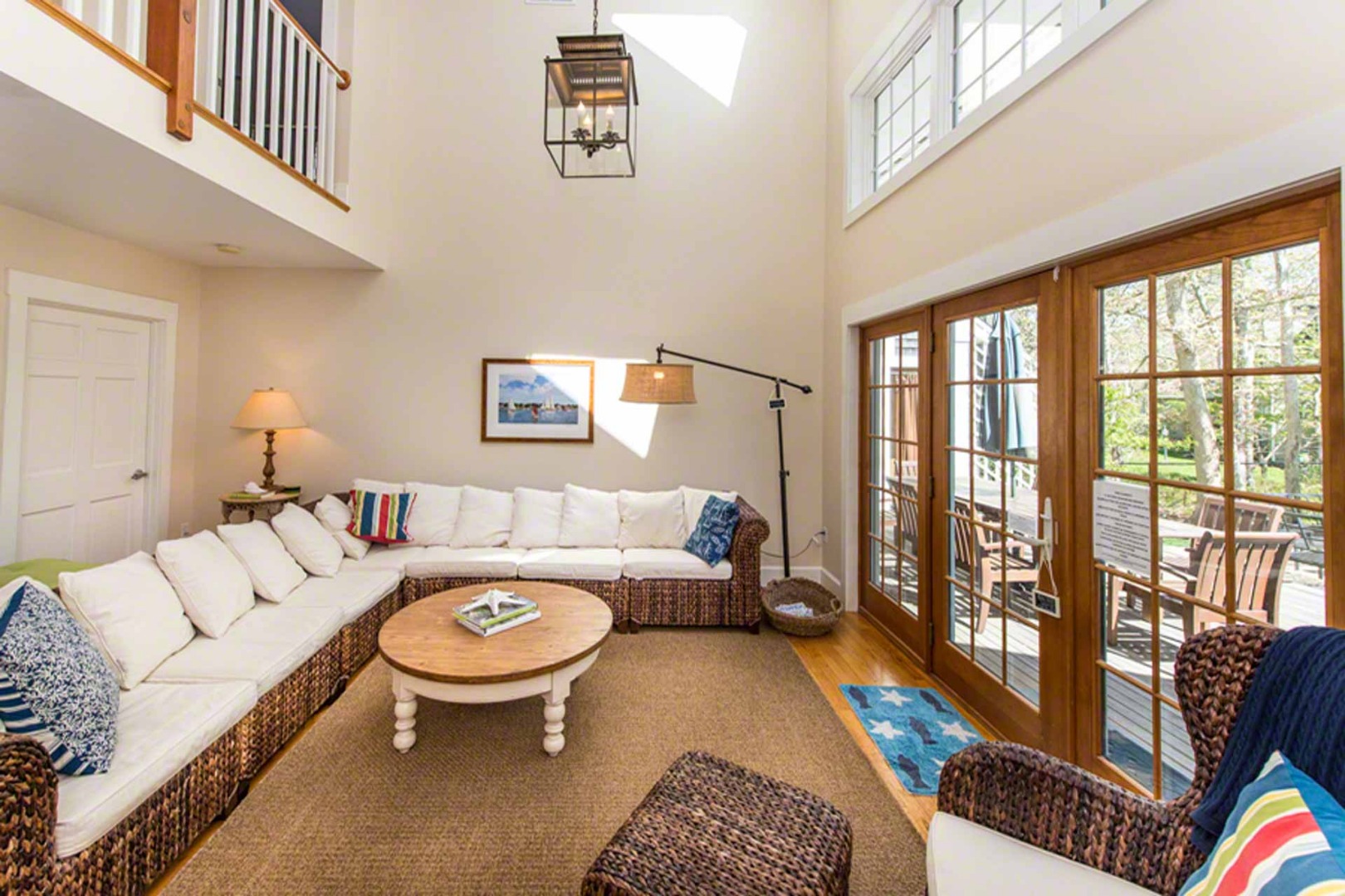 40 Dark Woods Road Edgartown, MA 02539 - Photo 7 of 20 a living room with furniture and a floor to ceiling window