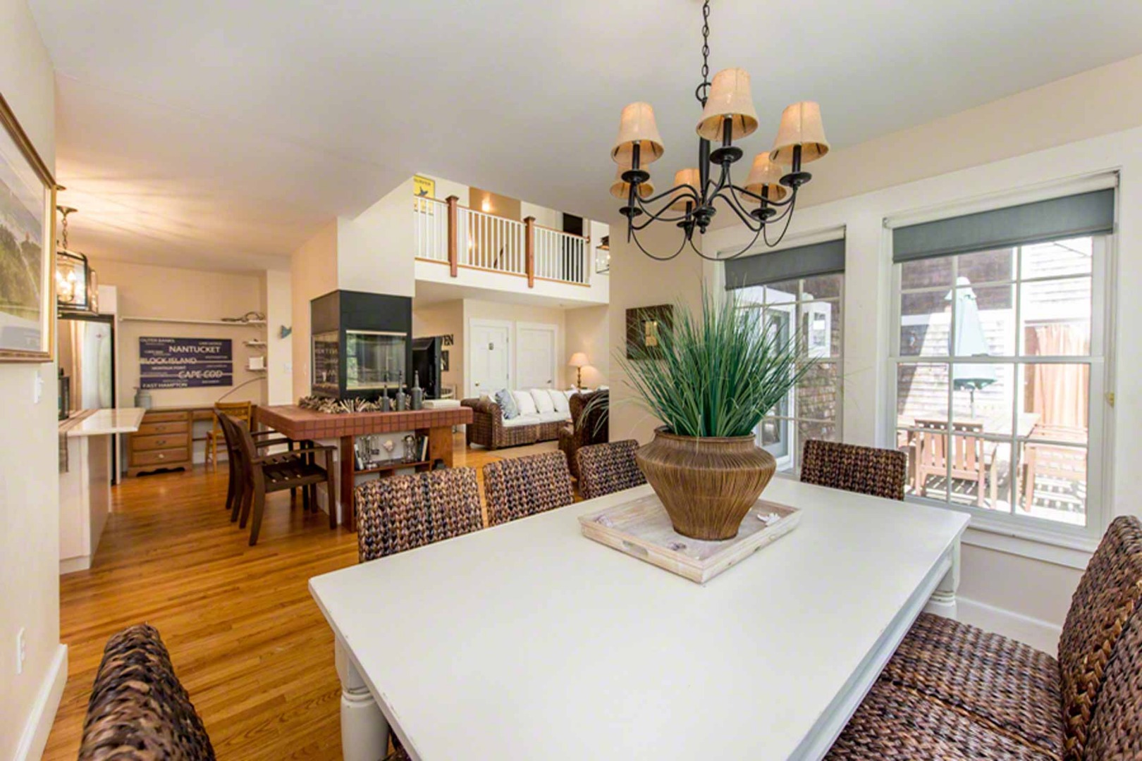 40 Dark Woods Road Edgartown, MA 02539 - Photo 9 of 20 a view of a dining room with furniture and a chandelier