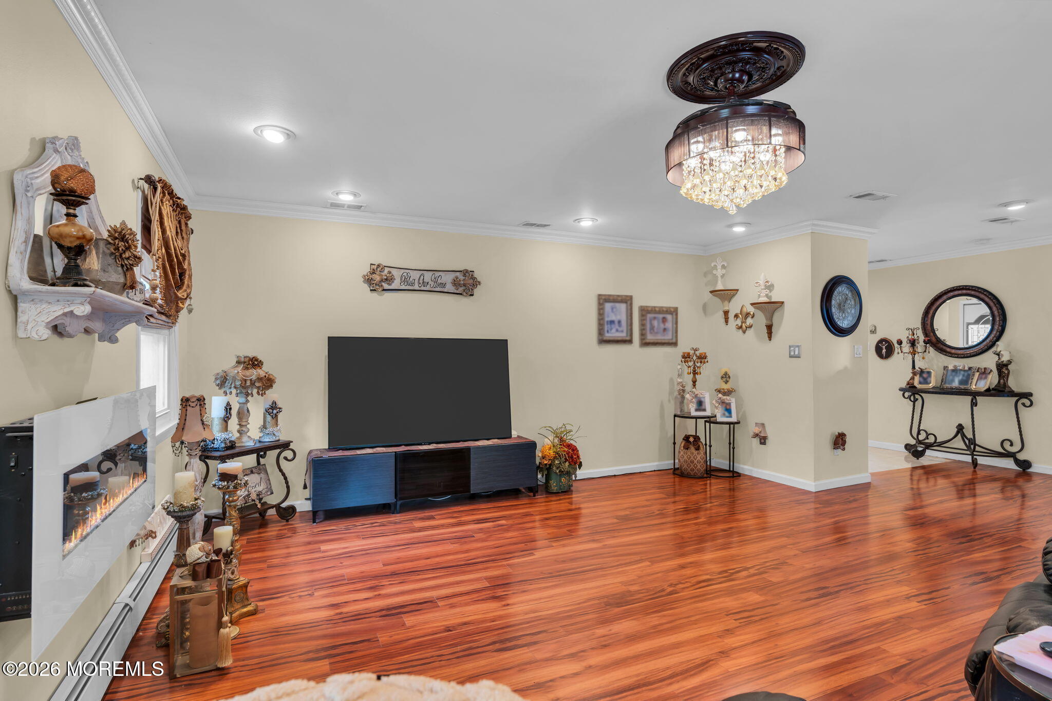 8 Owens Road Marlboro, NJ 07746 - Photo 22 of 39 a view of a room with furniture and wooden floor