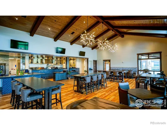 a living room filled with lots of furniture