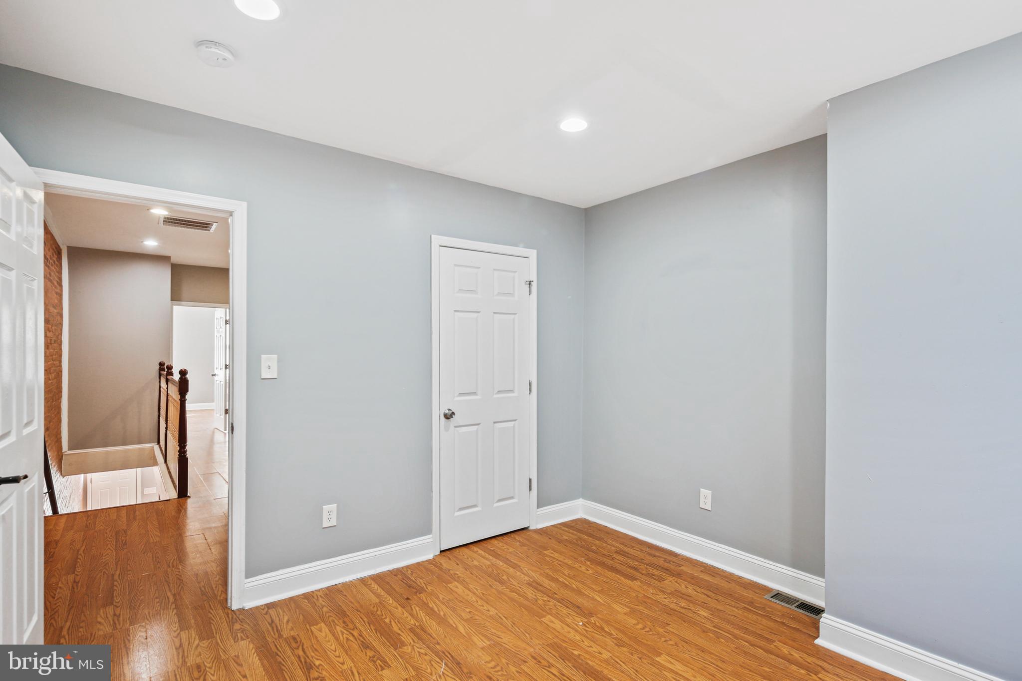 2806 Orleans Street Baltimore, MD 21224 - Photo 17 of 29 Upper Level Bedroom 2 with Hardwood Flooring