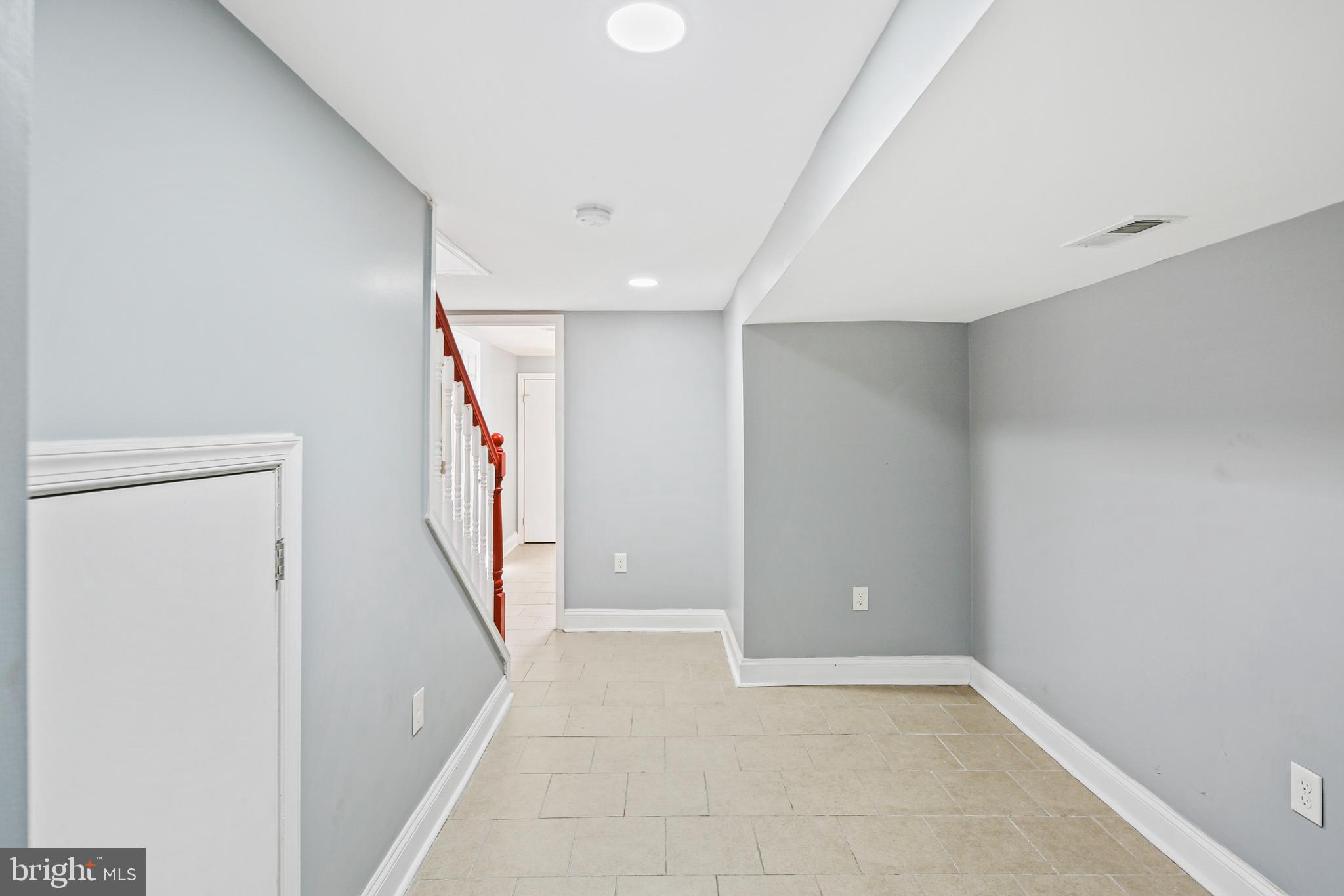 2806 Orleans Street Baltimore, MD 21224 - Photo 23 of 29 Lower Level Recreation Room with Ceramic Tile