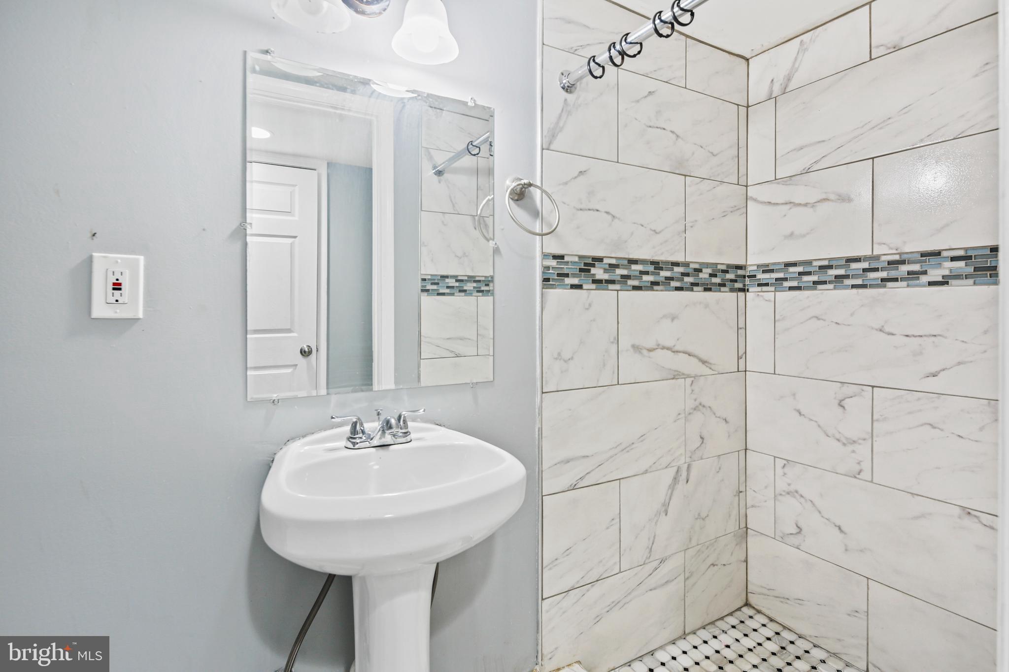 2806 Orleans Street Baltimore, MD 21224 - Photo 24 of 29 Lower Level Full Bath with Walk-In Shower