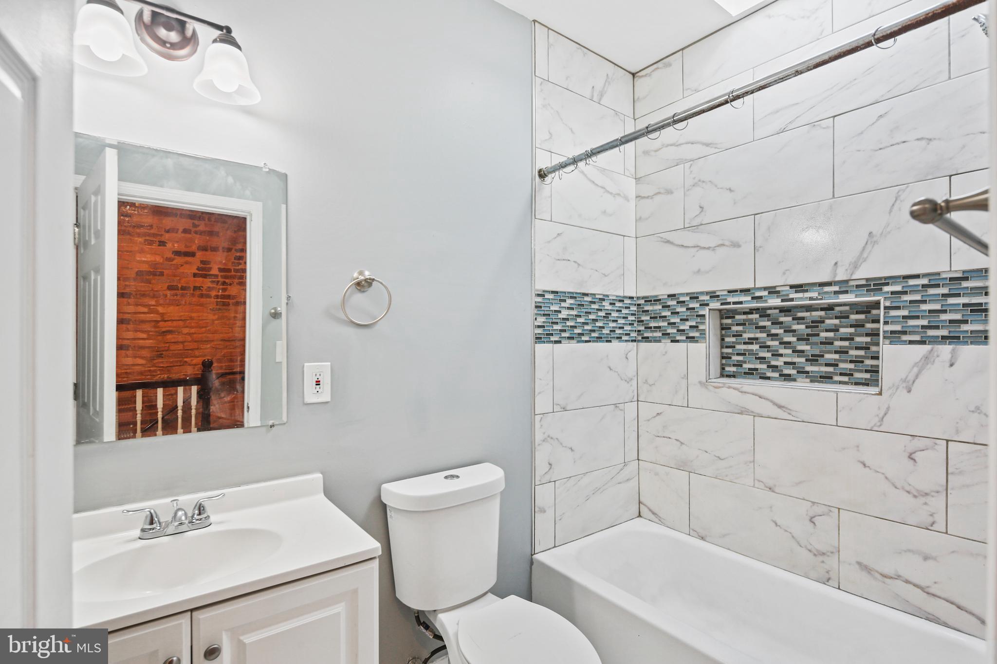 2806 Orleans Street Baltimore, MD 21224 - Photo 4 of 29 Upper Level Full Bath w/Custom tilework