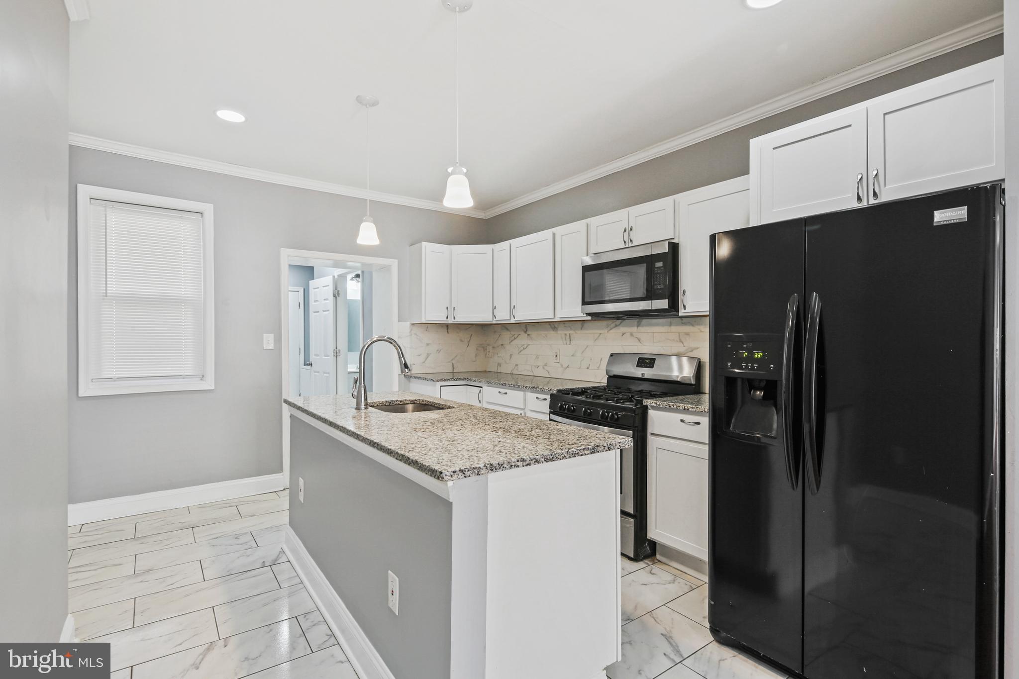 2806 Orleans Street Baltimore, MD 21224 - Photo 8 of 29 Gourmet Kitchen with Granite Counters