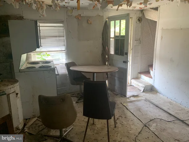 a room with furniture and window