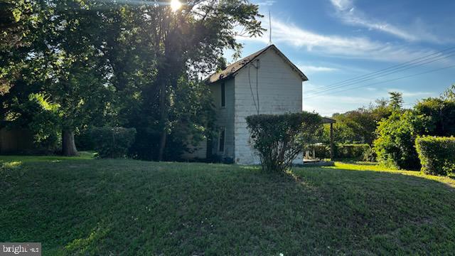 461 Jewell Road Friendship, MD 20758 - Photo 3 of 4 a view of a backyard with large trees