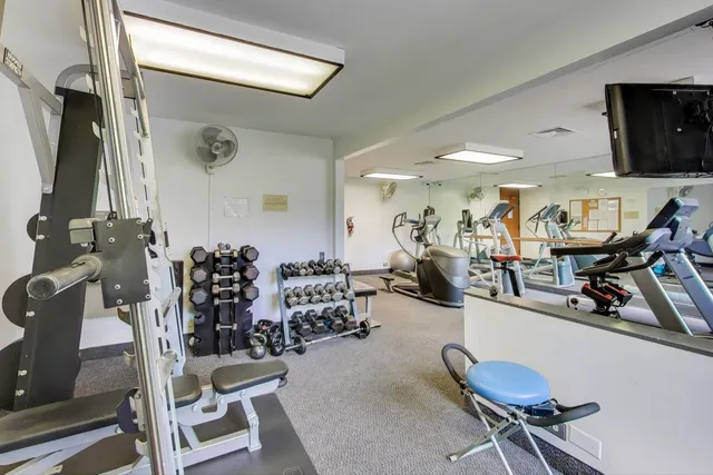 a view of a room with gym equipment