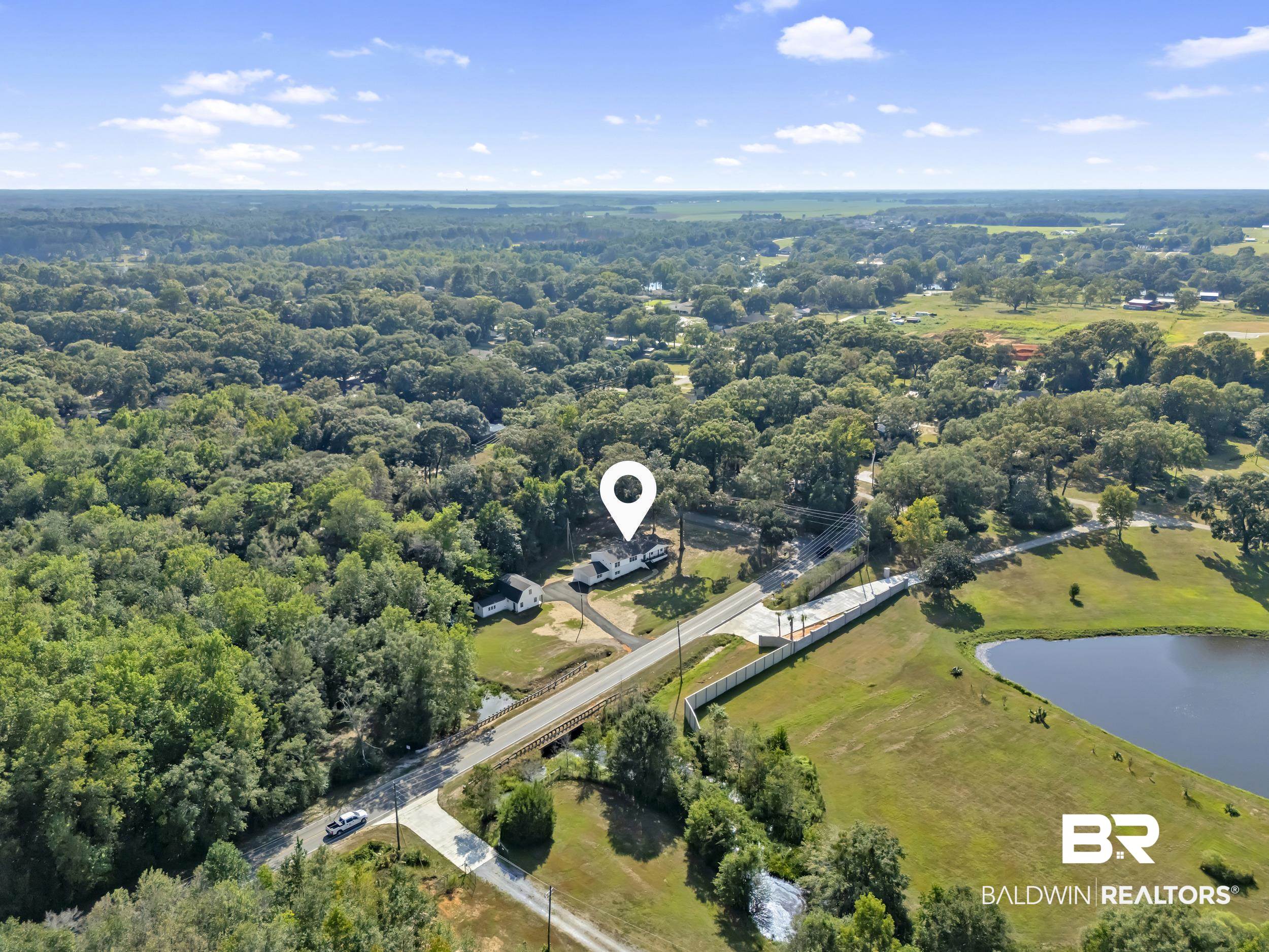 8351 Theodore Dawes Road Theodore, AL 36582 - Photo 41 of 46 Bird's eye view of a large body of water