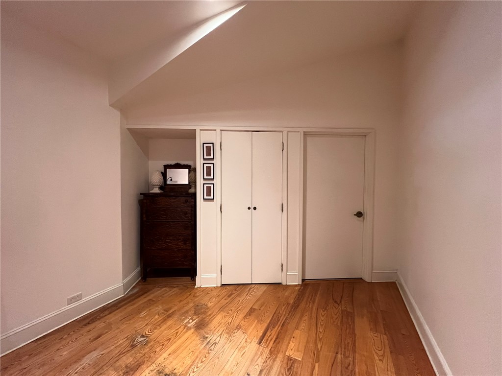 109 Buckingham Road Easley, SC 29640 - Photo 30 of 40 This inviting bedroom features warm wood flooring and ample storage with convenient closet space.