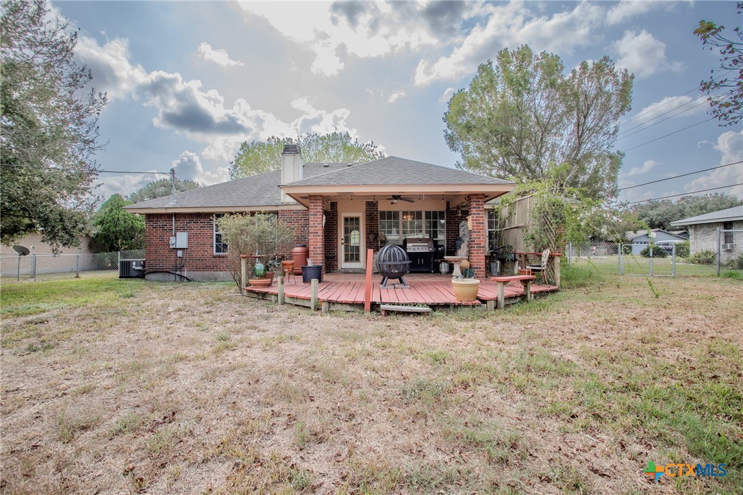 204 Grouse Road Victoria, TX 77905 - Photo 24 of 25 a view of a house with a backyard and a patio