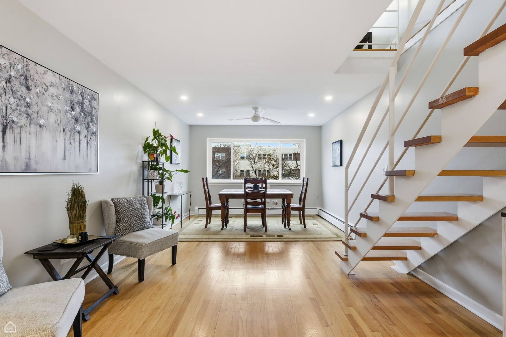 6619 North Sheridan Road, Unit 401 Chicago, IL 60626 - Photo 2 of 19 a dining room with furniture entryway and wooden floor