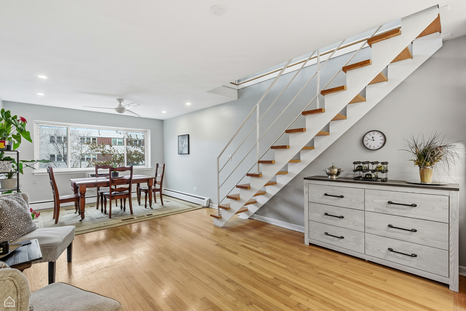 6619 North Sheridan Road, Unit 401 Chicago, IL 60626 - Photo 4 of 19 a view of dining room and hall with wooden floor