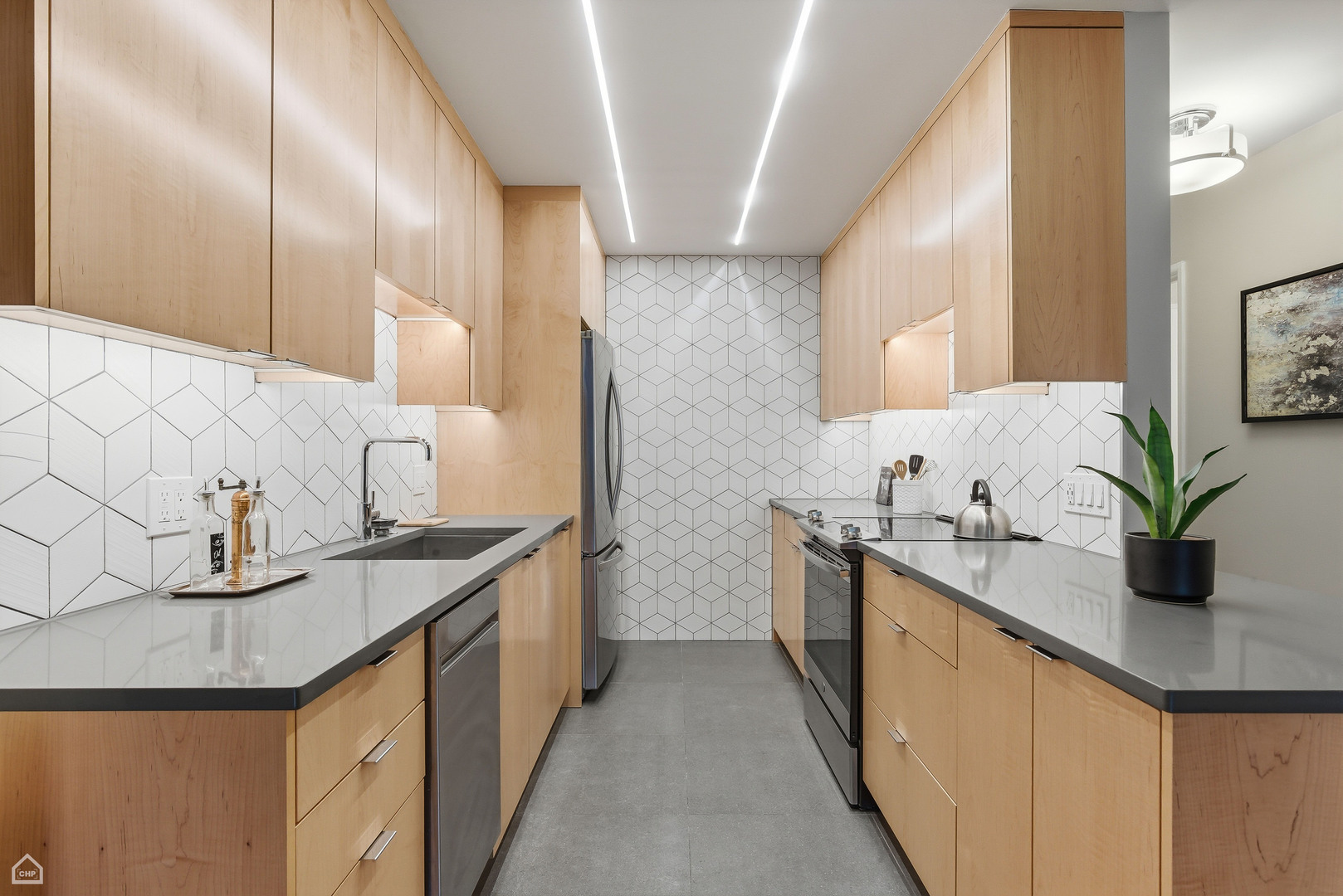 6619 North Sheridan Road, Unit 401 Chicago, IL 60626 - Photo 6 of 19 a kitchen with a sink and cabinets