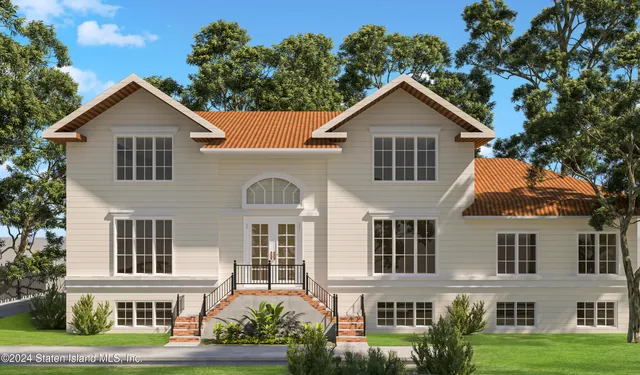 a front view of a house with garden