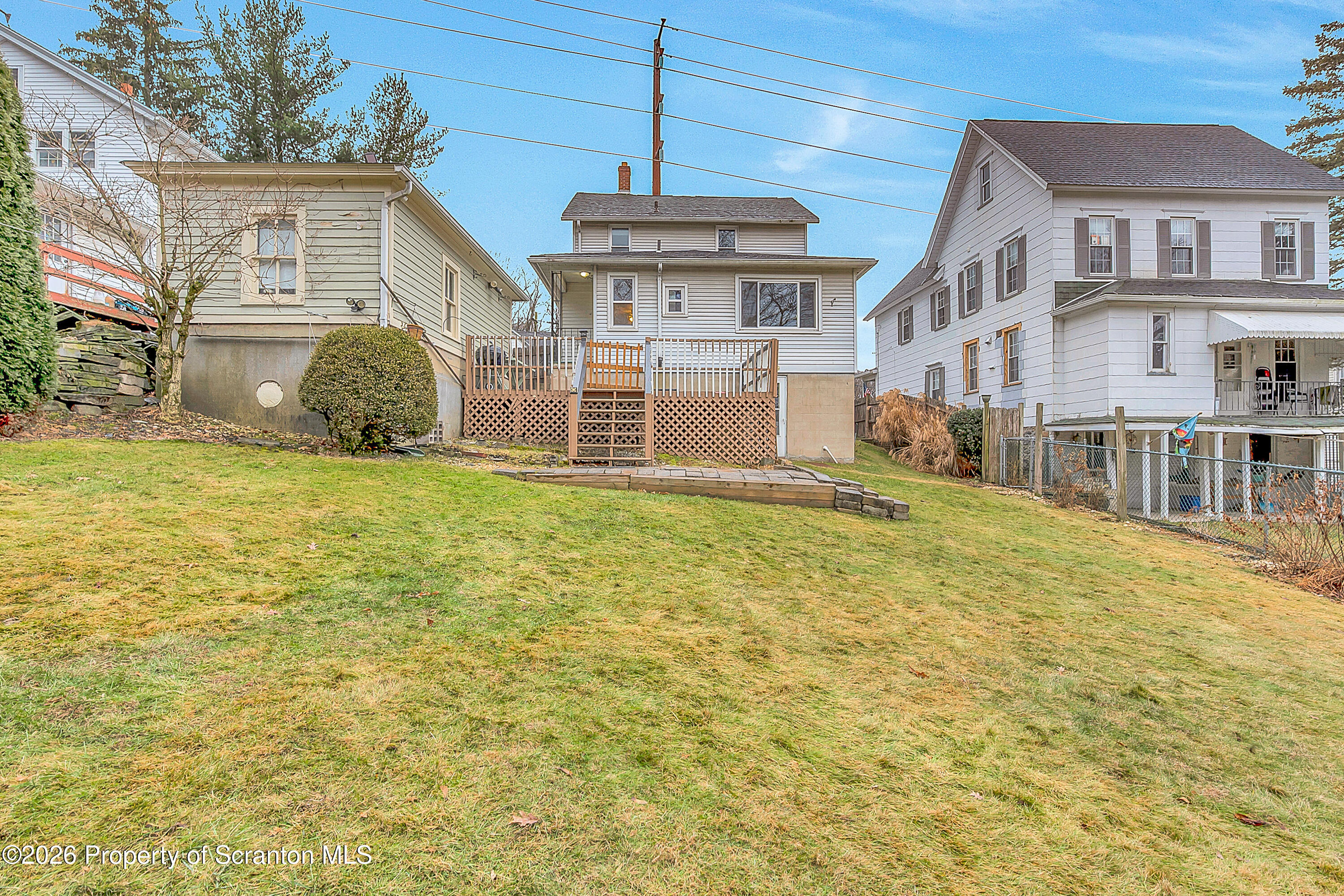 123 William Street Scranton, PA 18510 - Photo 4 of 22 a front view of a house with a yard