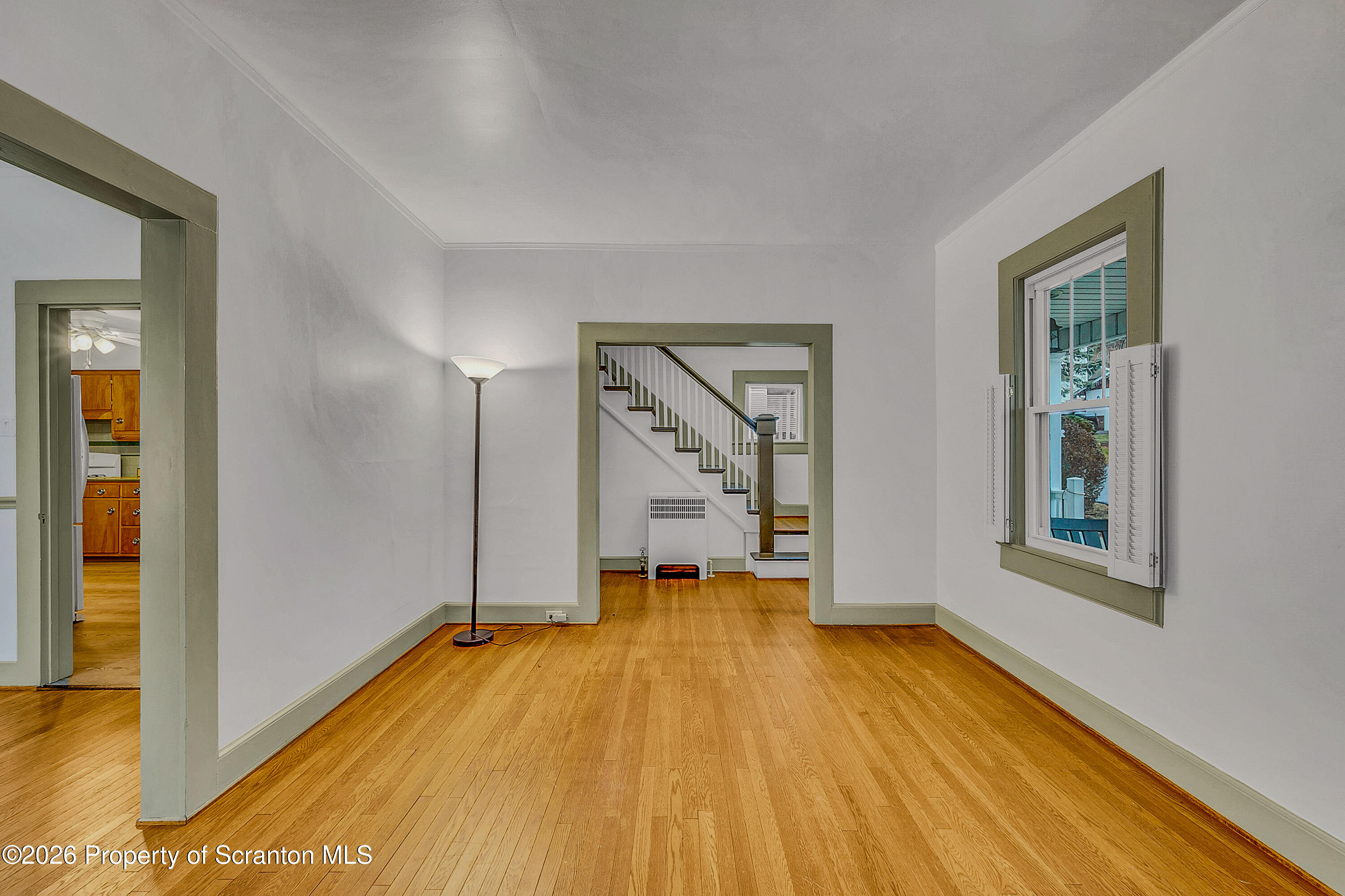 123 William Street Scranton, PA 18510 - Photo 8 of 22 a view of a room with wooden floor and a window