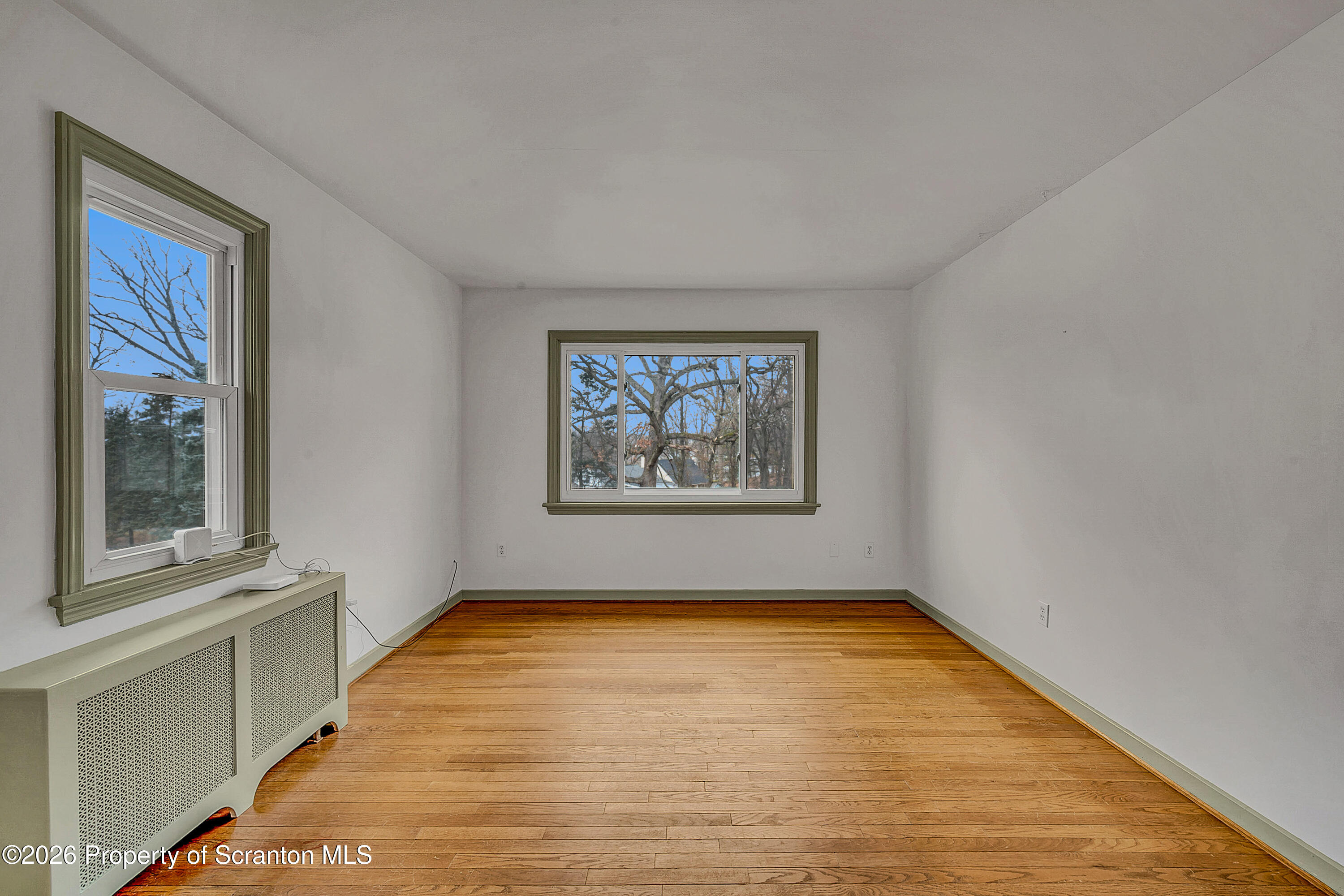 123 William Street Scranton, PA 18510 - Photo 10 of 22 a view of an empty room with a window