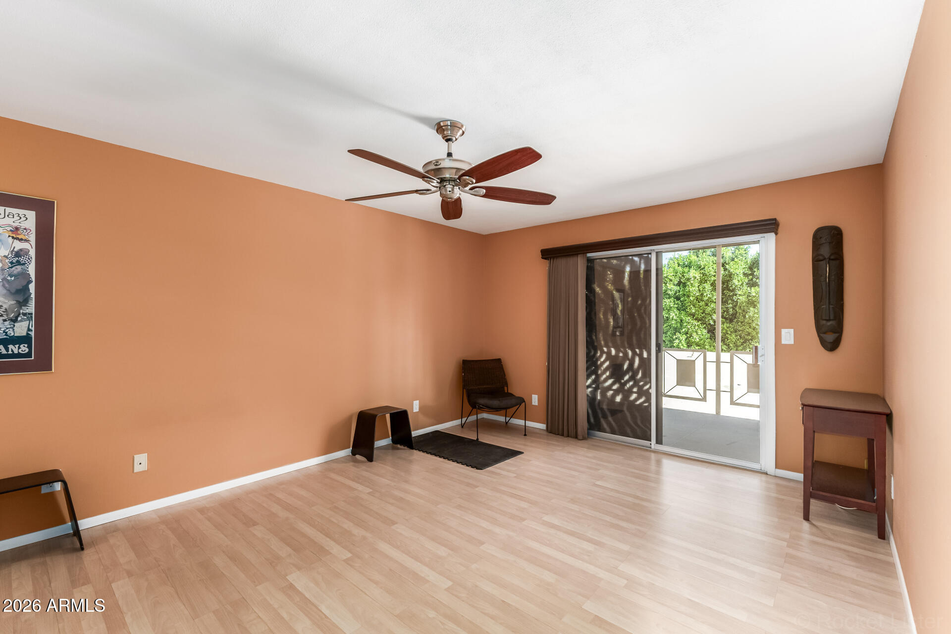 725 South Power Road, Unit 217 Mesa, AZ 85206 - Photo 13 of 29 a workspace with furniture window and a ceiling fan