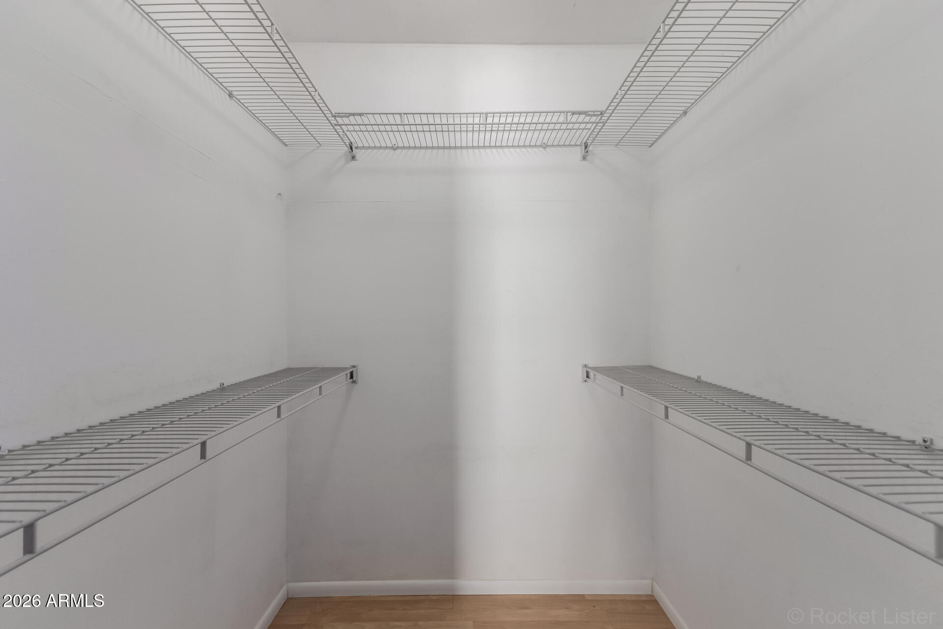 725 South Power Road, Unit 217 Mesa, AZ 85206 - Photo 16 of 29 a view of a room with racks on the wall