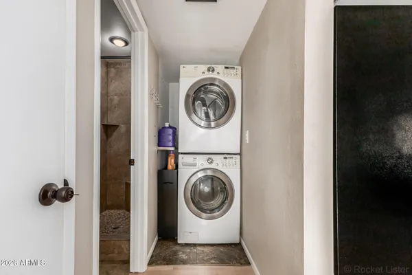 a view of an chairs and tables in the balcony