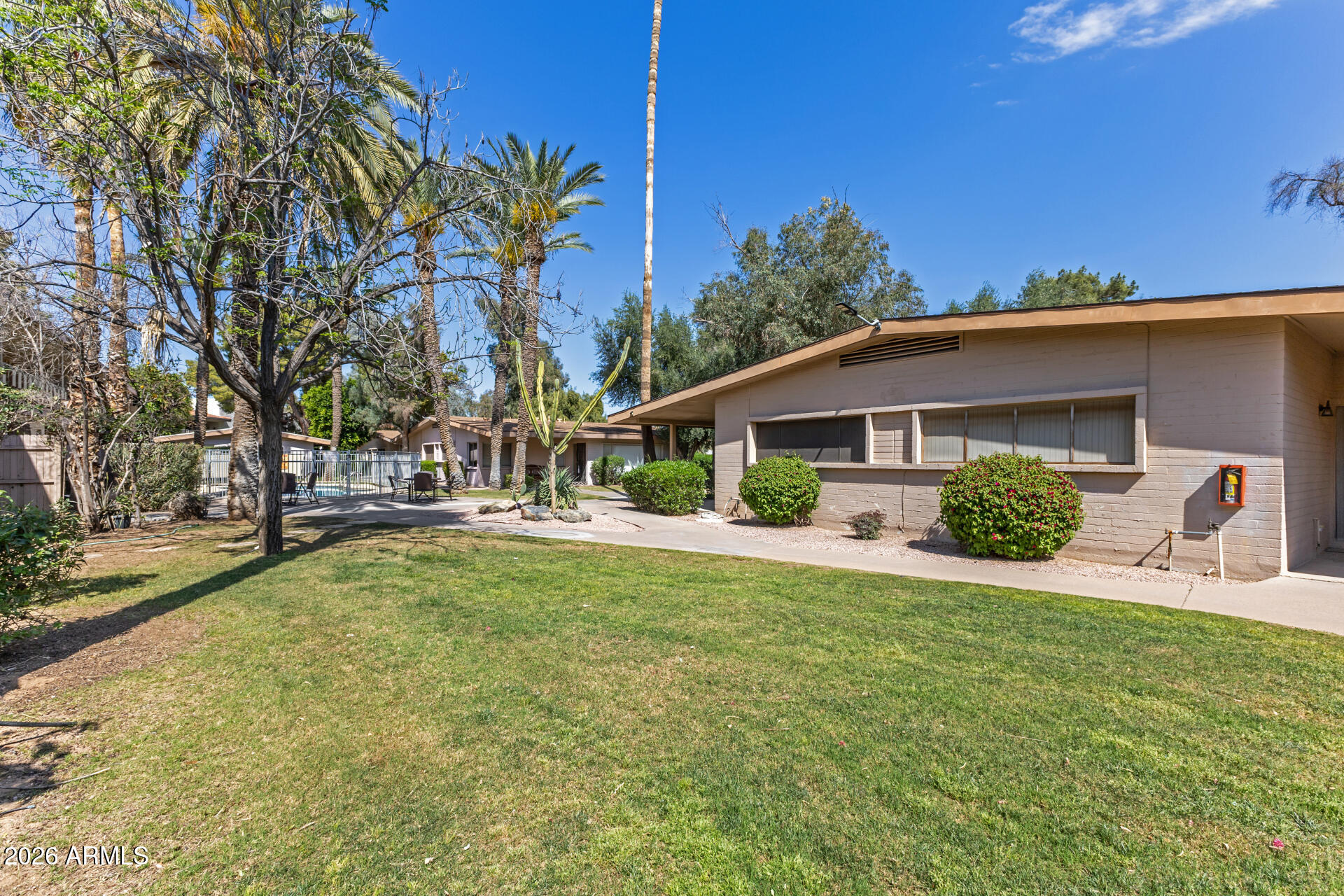 725 South Power Road, Unit 217 Mesa, AZ 85206 - Photo 26 of 29 a view of a house with a yard