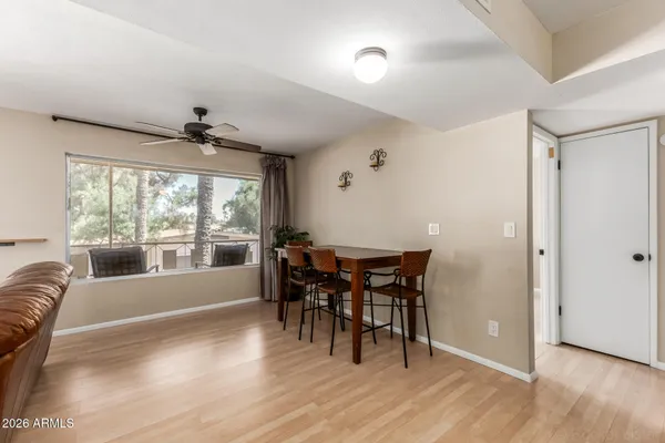 a kitchen with stainless steel appliances granite countertop a stove a refrigerator and a microwave