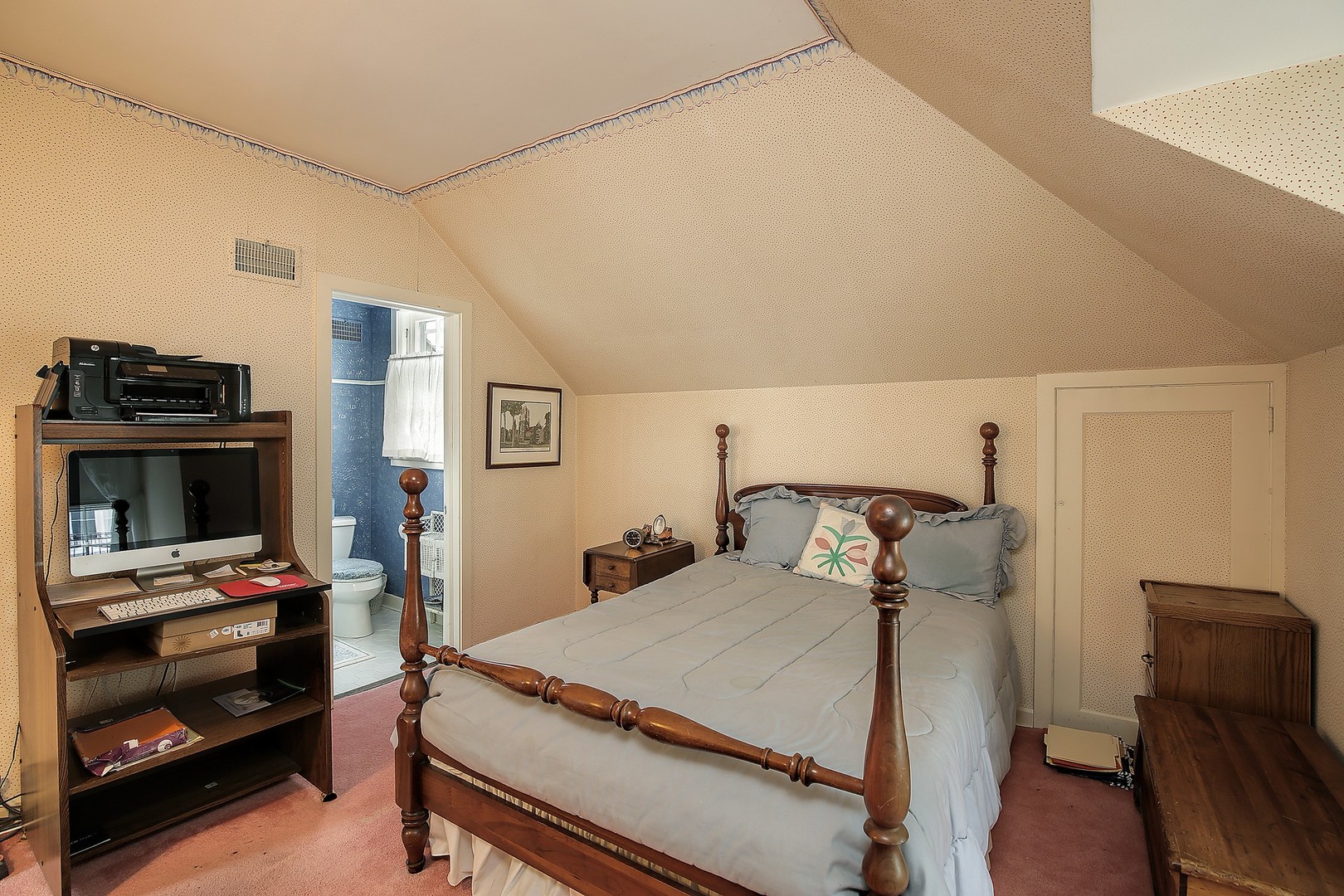 1253 Ridge Road Wilmette, IL 60091 - Photo 14 of 16 a bedroom with a bed and a tv on the dresser