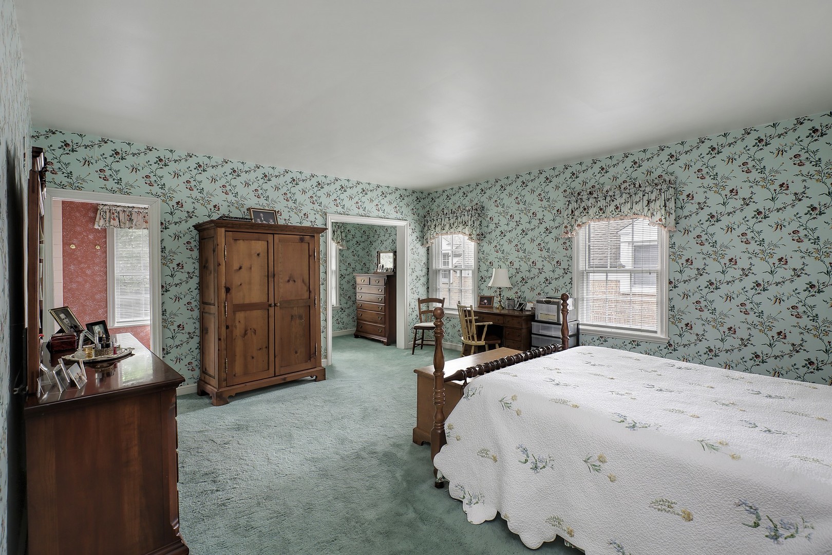 1253 Ridge Road Wilmette, IL 60091 - Photo 10 of 16 a spacious bedroom with a bed and a dresser