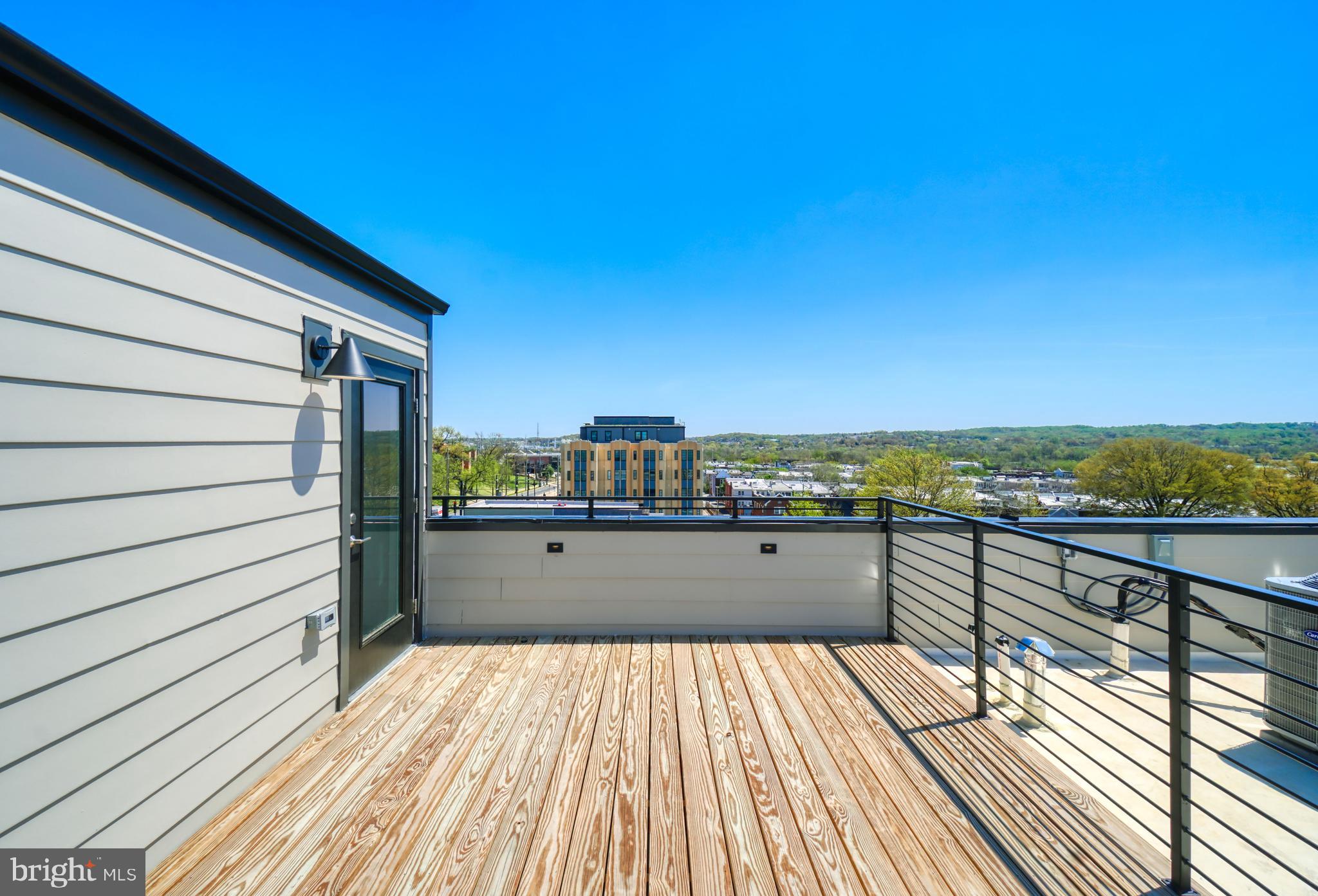 2013 Benning Road Northeast, Unit 8 Washington, DC 20002 - Photo 26 of 35 Rooftop Deck