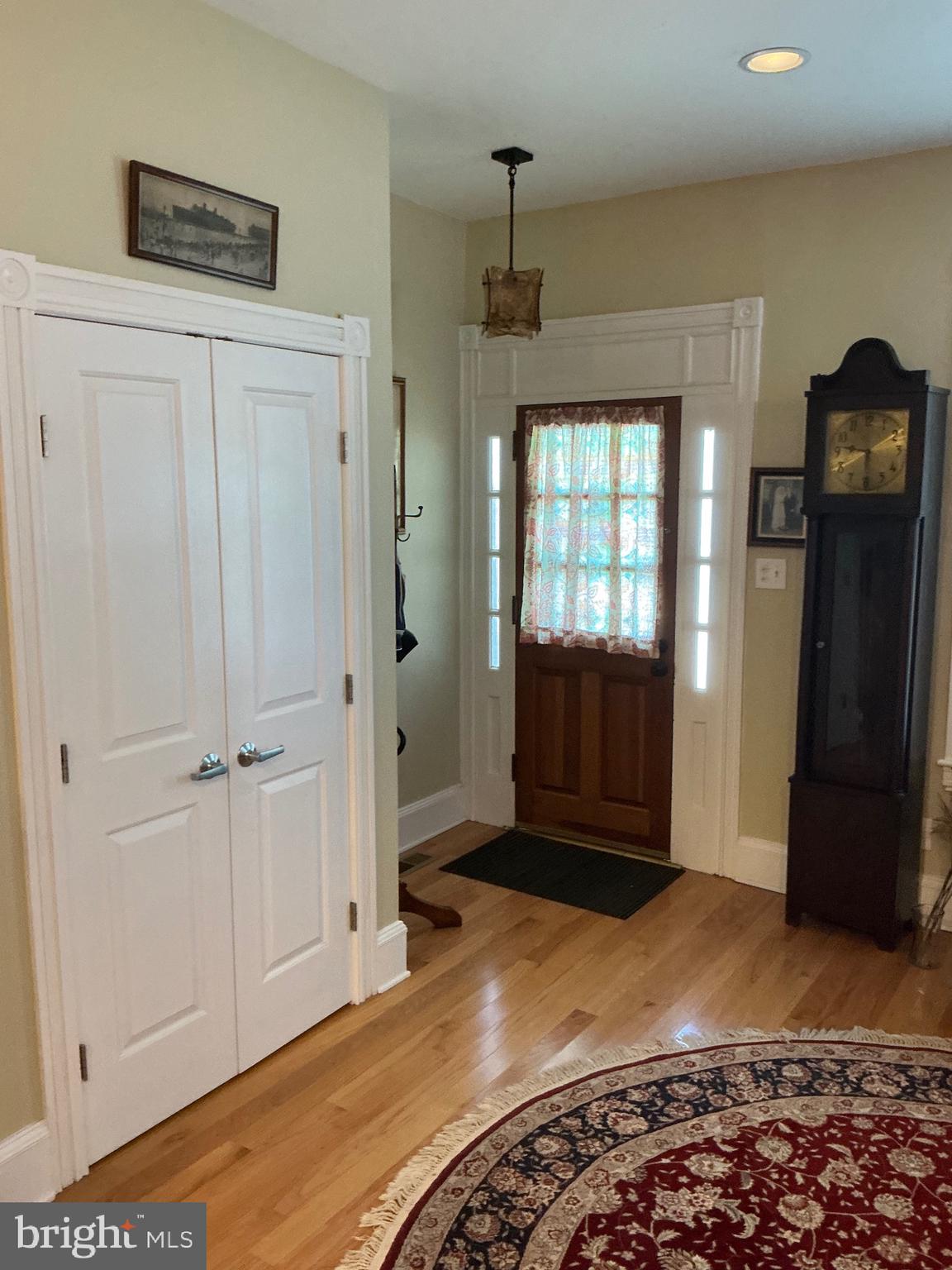 29 Centre Street Haddonfield, NJ 08033 - Photo 3 of 39 a bedroom with a bed and wooden floor