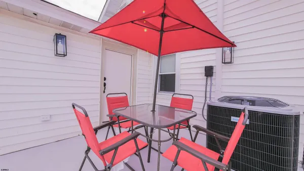 a view of a back yard of the house