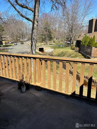 a view of swimming pool with a yard
